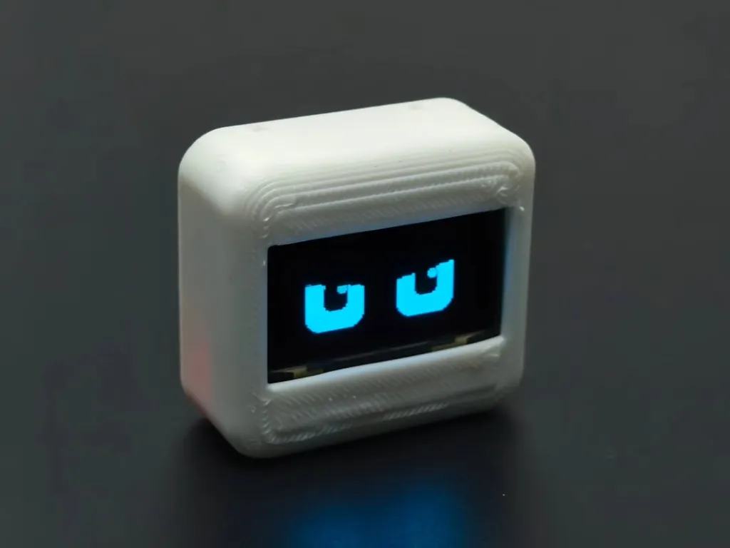 Open source DIY pet Robotall files available FeaturesCute emotional animations on OLED displayT.heic (2).webp